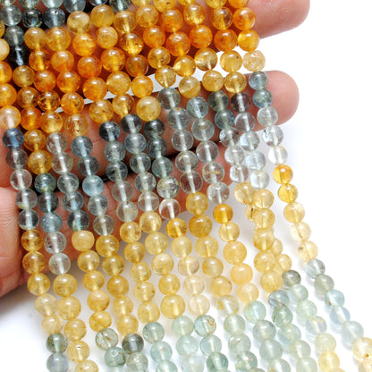 Aquamarine 5mm round beads March birthstone - side profile
