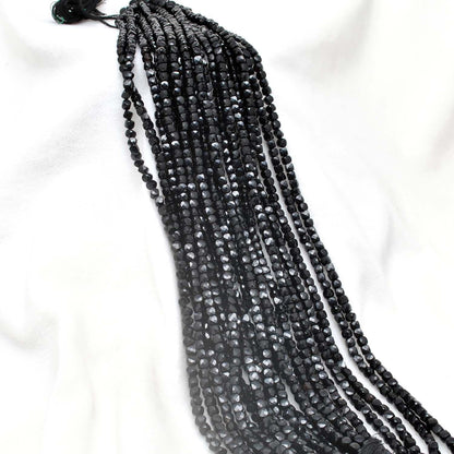 Black onyx 4mm cube beads for modern jewelry - side profile