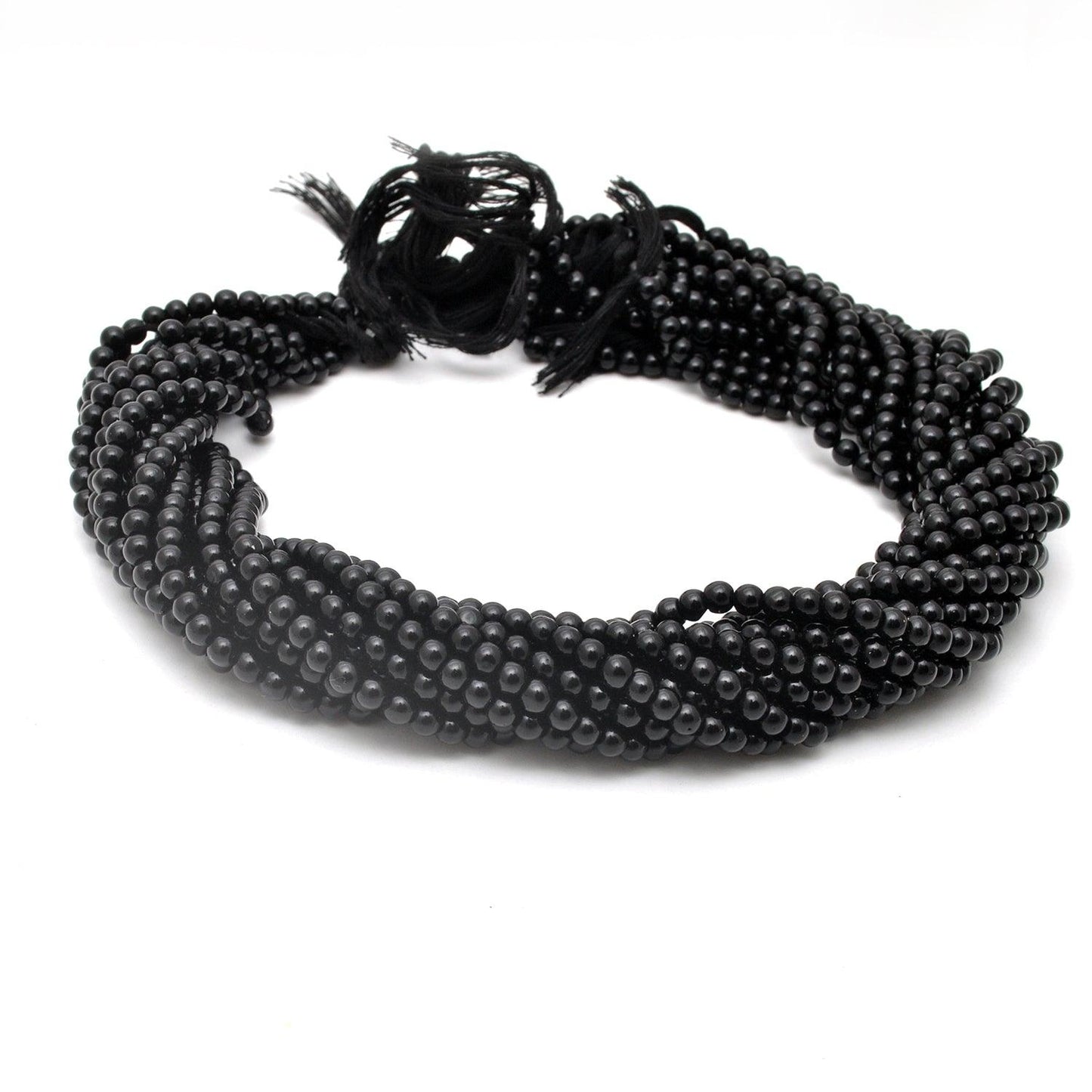 Black onyx plain round beads - close-up lustrous dark detail