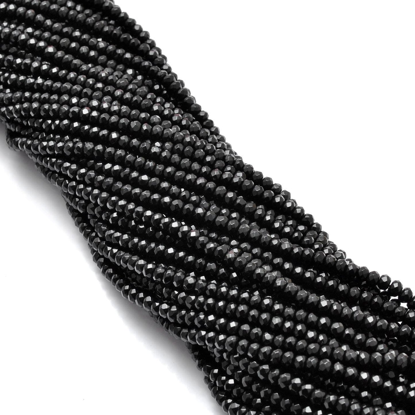 Black onyx rondelle beads for jewelry making - scale reference