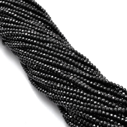 Black onyx rondelle beads for jewelry making - scale reference