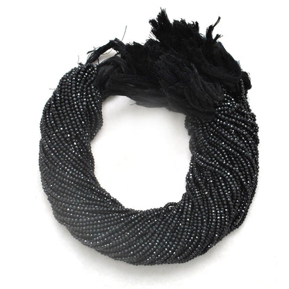 Black spinel rondelle 4mm beads - close-up jet black brilliance