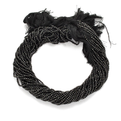 Black spinel round faceted beads - close-up brilliant lustre detail