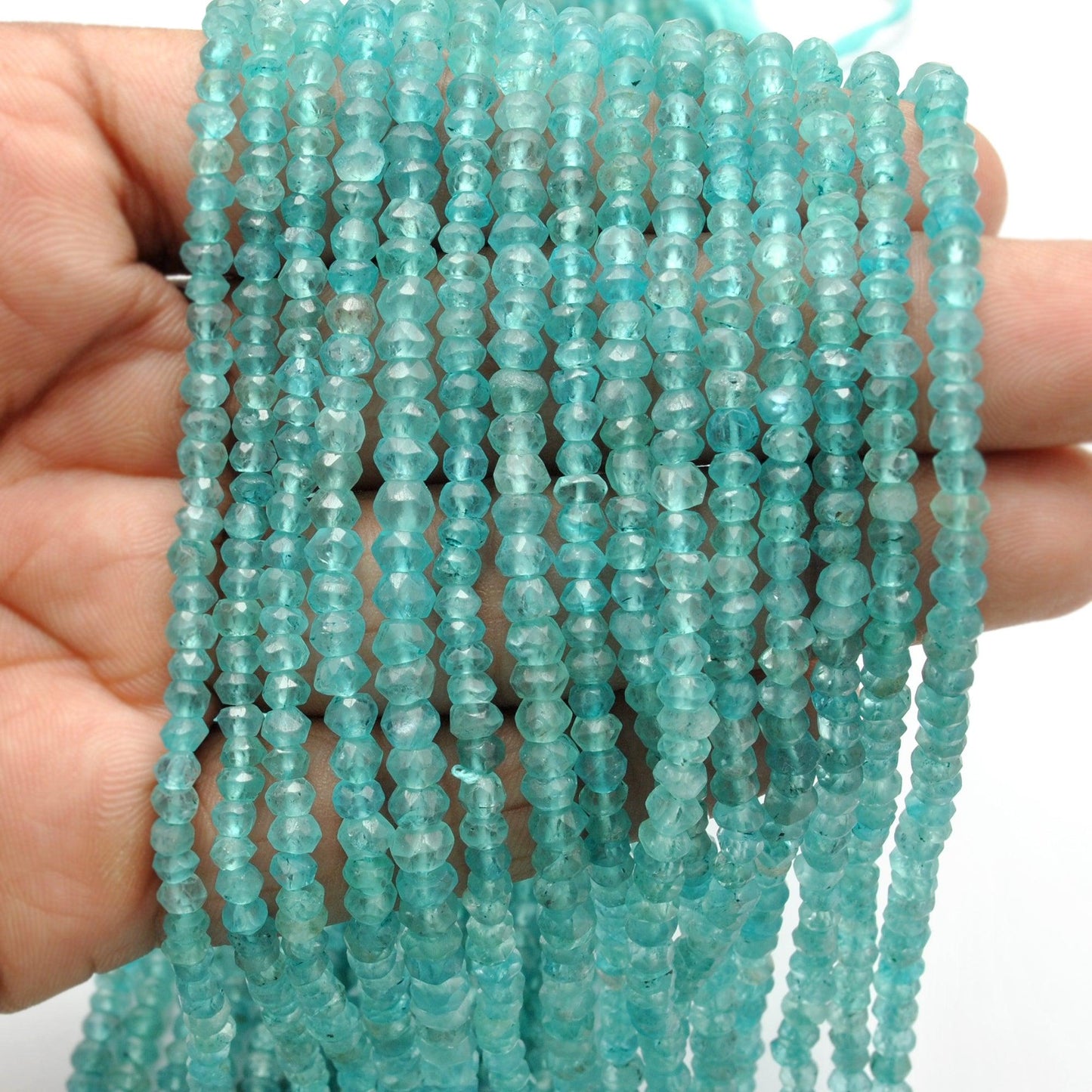 Blue apatite faceted rondelle wholesale strand - Jaipur quality