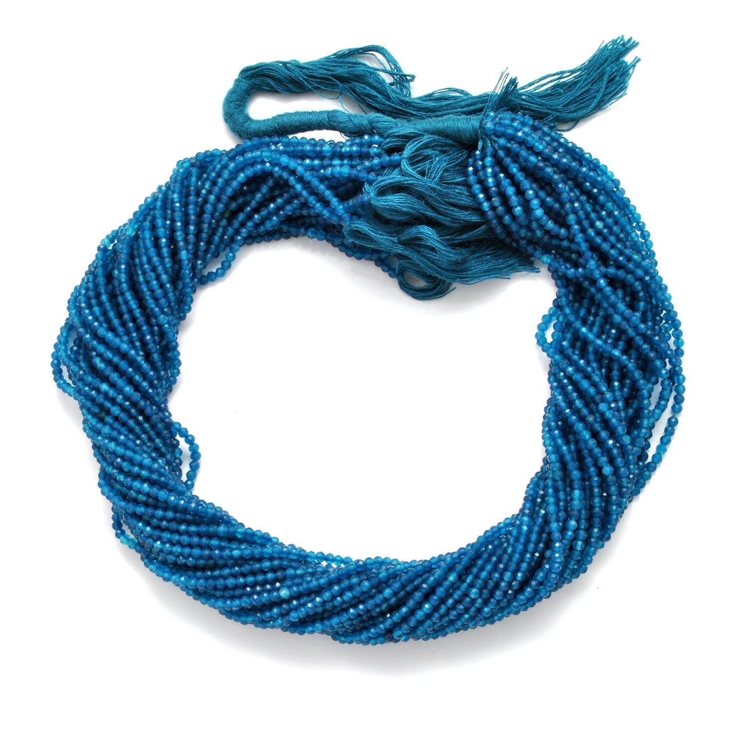 Blue apatite faceted round beads - close-up vivid electric blue