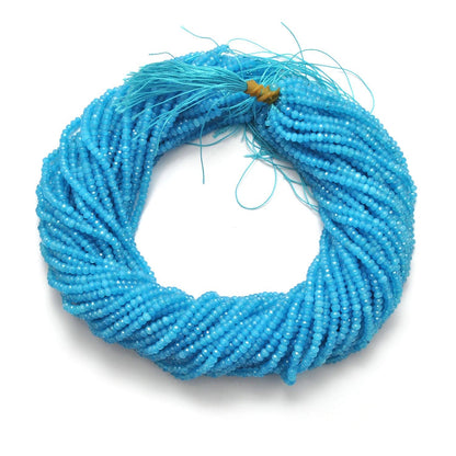 Blue apatite quartz beads - close-up vivid teal-blue color