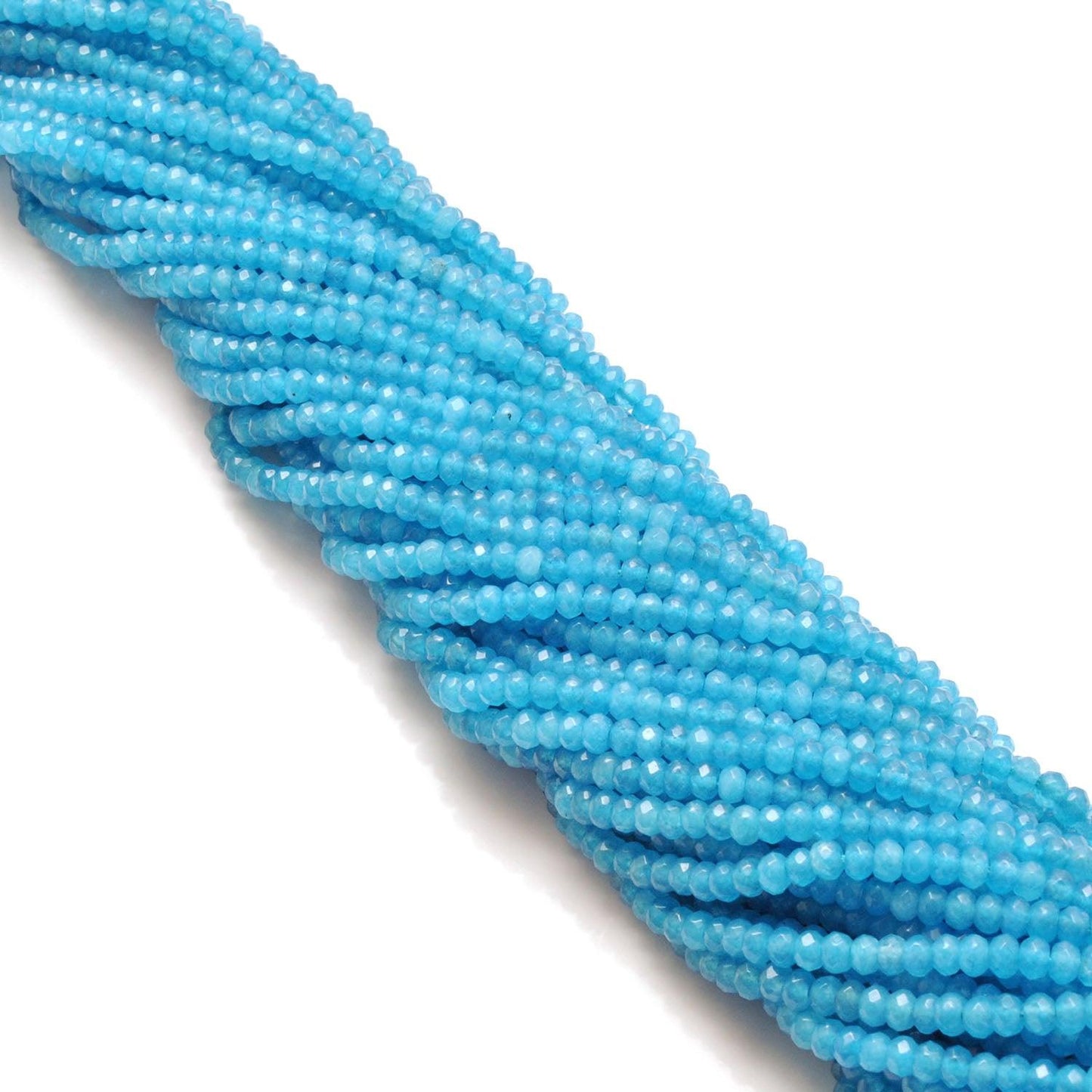 Blue apatite quartz faceted beads - side profile scattered loose