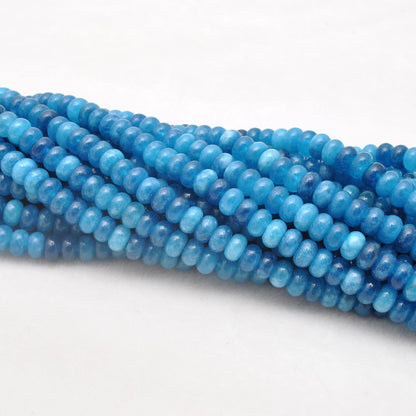 Blue apatite quartz rondelle beads for jewelry making - scale reference