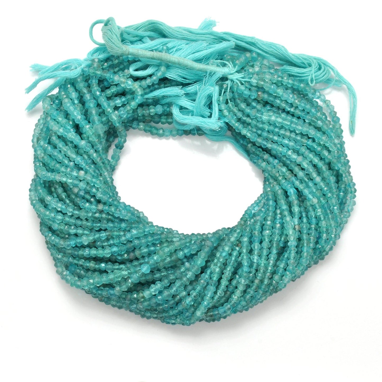 Blue apatite rondelle beads - close-up electric blue disc detail
