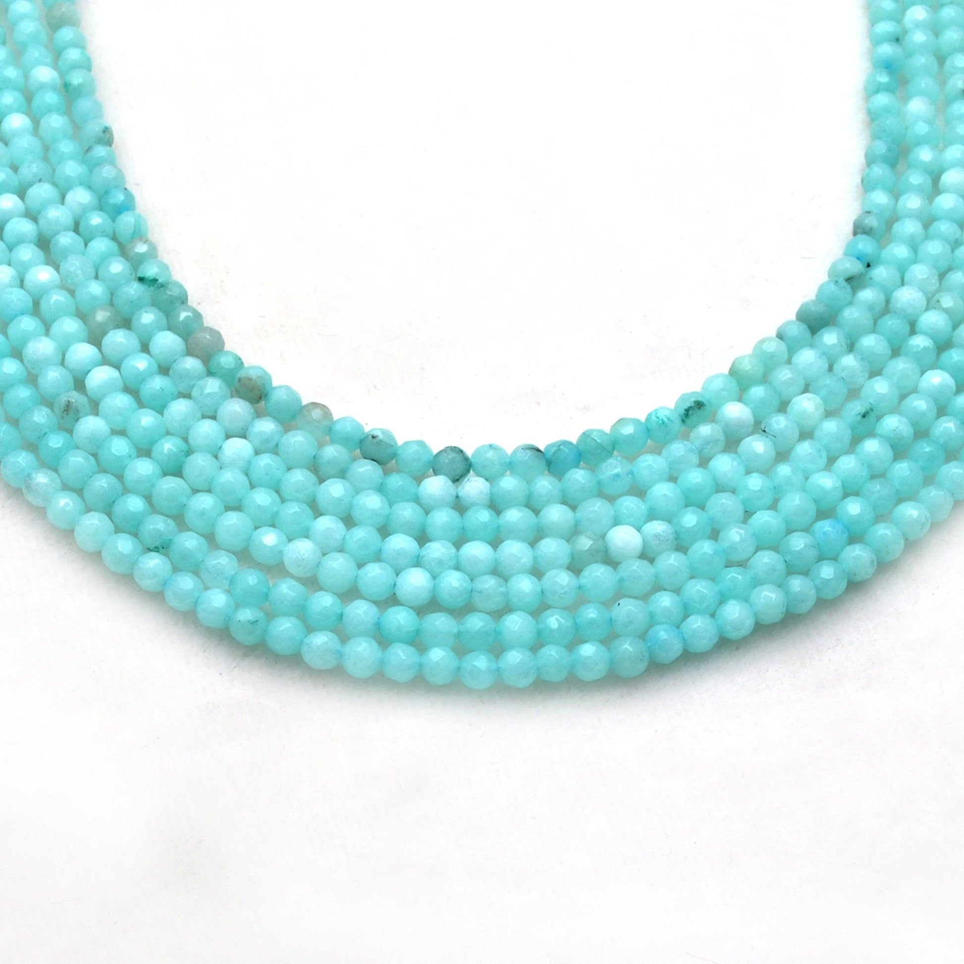 Blue aqua quartz faceted round beads - side profile light play
