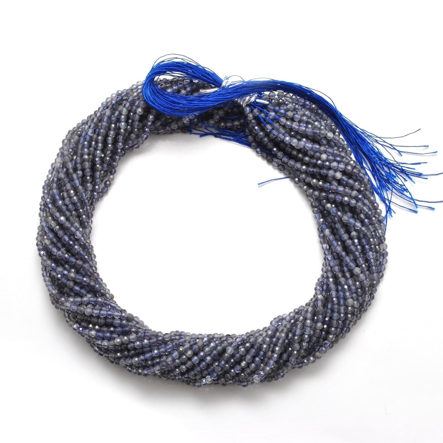 Blue iolite faceted beads - close-up pleochroic violet-blue color