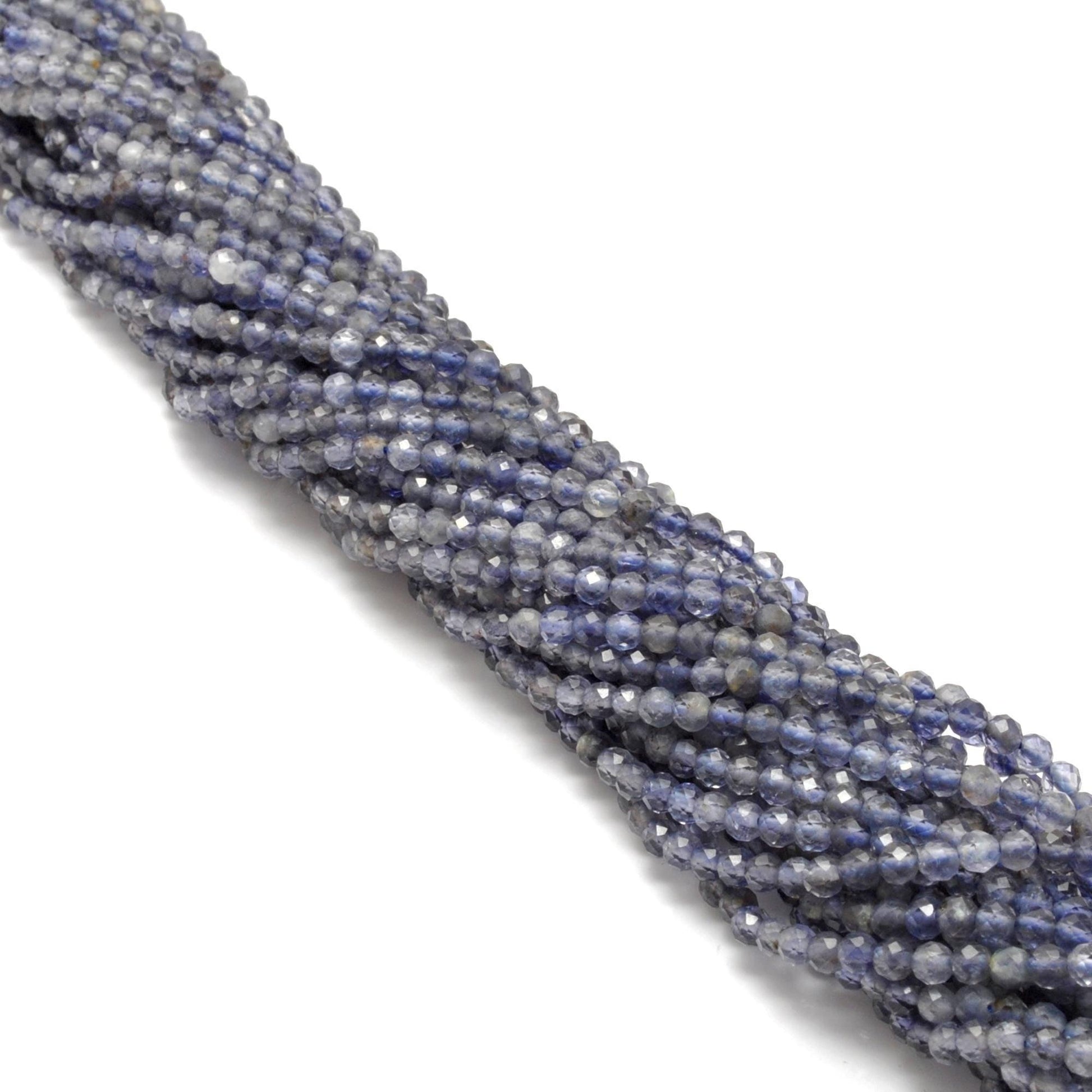 Blue iolite faceted beads - side profile color shift angle view