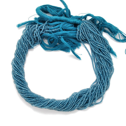 Blue quartz faceted round beads strand 12.5 inch - overhead flat lay