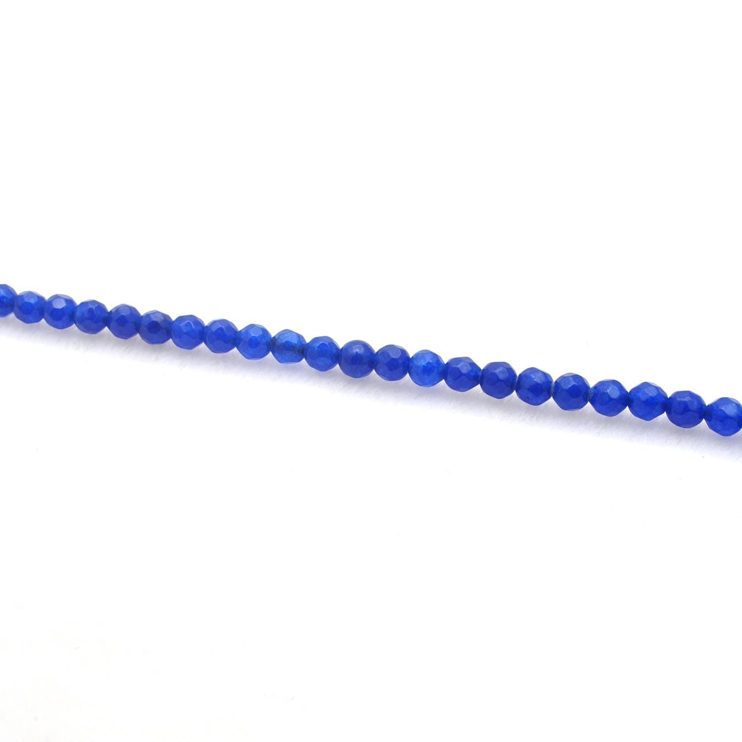 Blue quartz faceted round beads 15 inch - overhead flat lay view