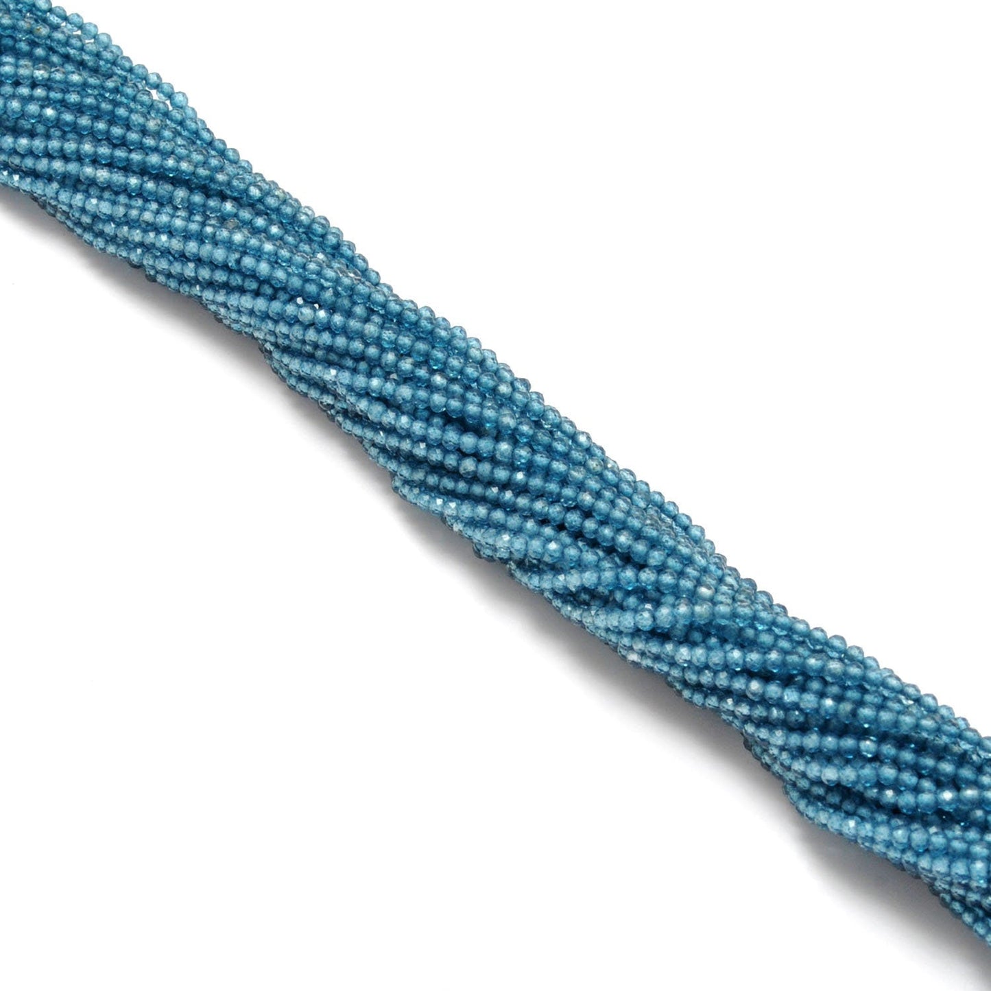 Blue quartz faceted round beads - side profile scattered loose