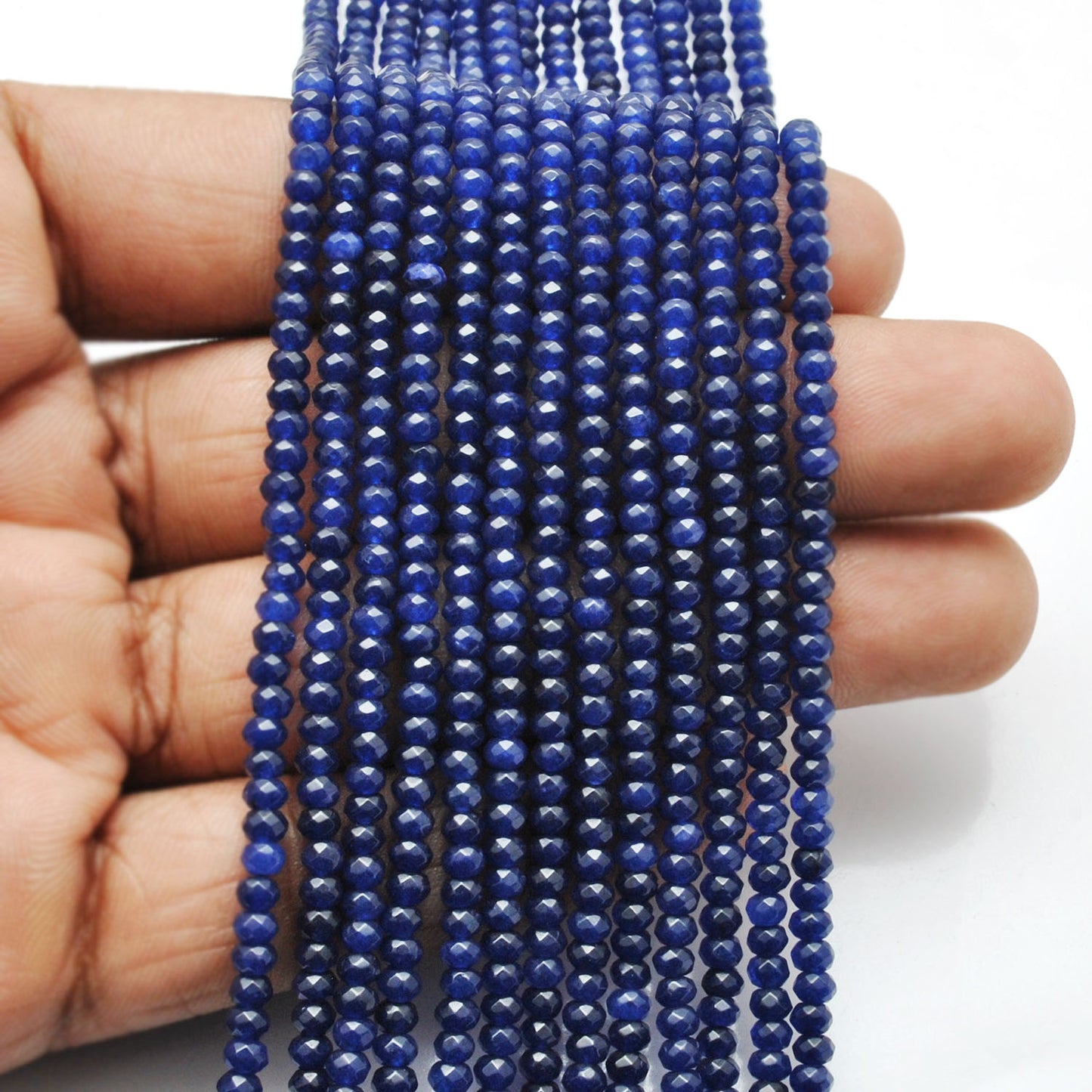 Blue quartz rondelle beads strand - loose scattered view
