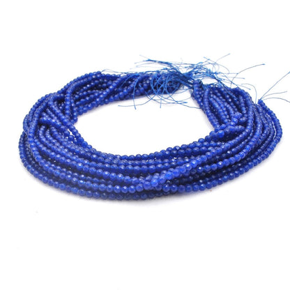 Blue quartz round beads strand - close-up soft blue faceted detail