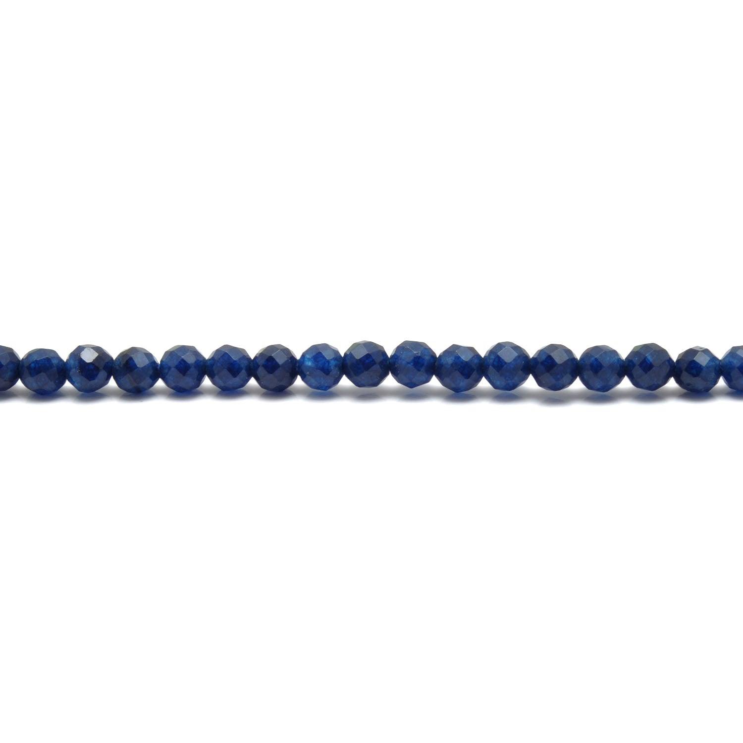 Blue quartz round faceted beads - scattered loose crystal view