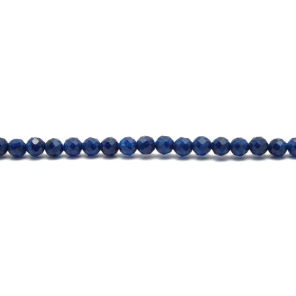 Blue quartz round faceted beads - scattered loose crystal view