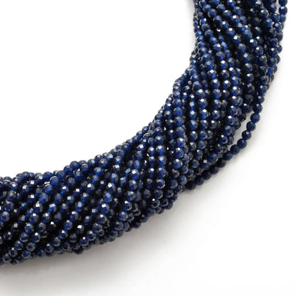 Blue quartz round faceted strand - overhead flat lay view