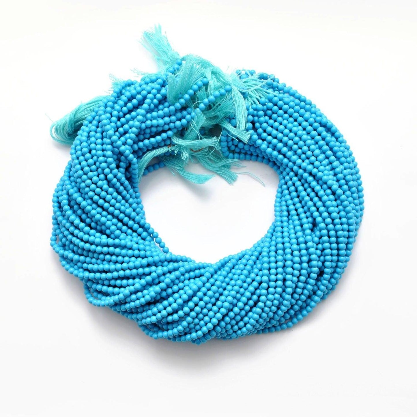 Blue turquoise round gemstone beads - close-up matrix veining detail