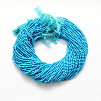 Blue turquoise round gemstone beads - close-up matrix veining detail