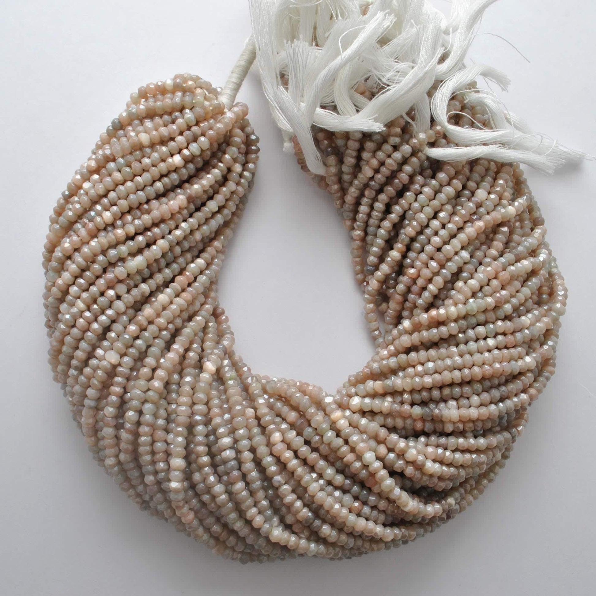Brown moonstone rondelle beads - close-up adularescence inner glow