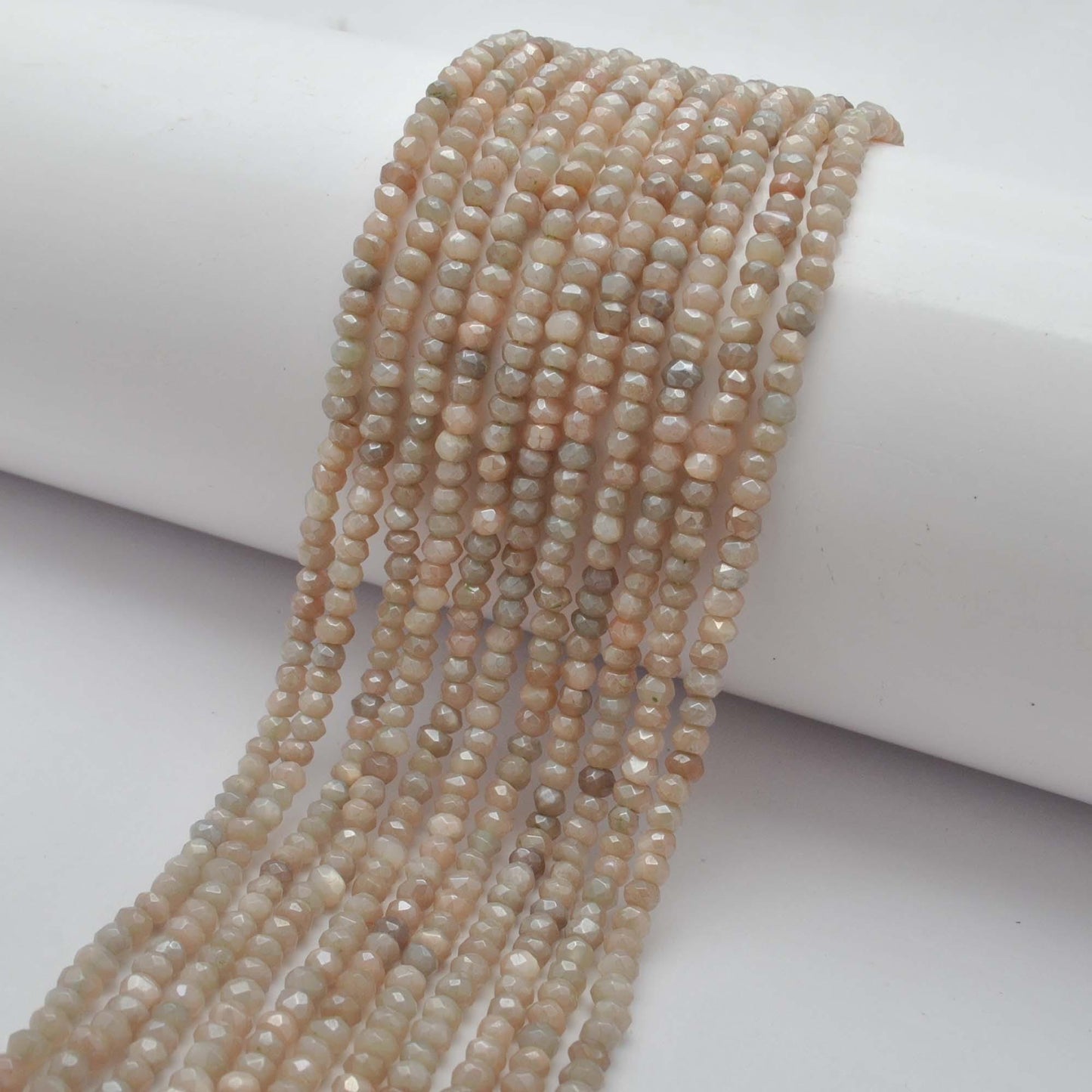 Brown moonstone rondelle beads for jewelry making - scale reference