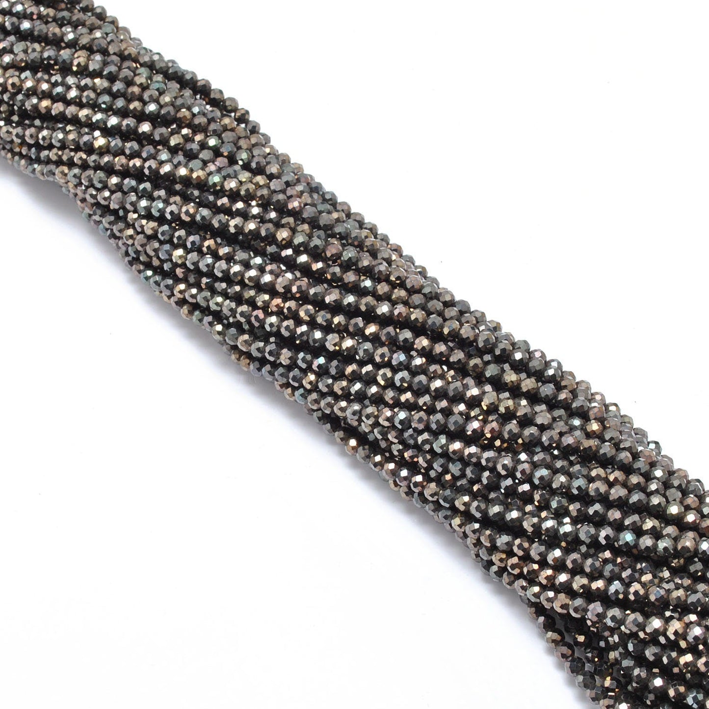 Brown pyrite faceted beads - side profile scattered loose