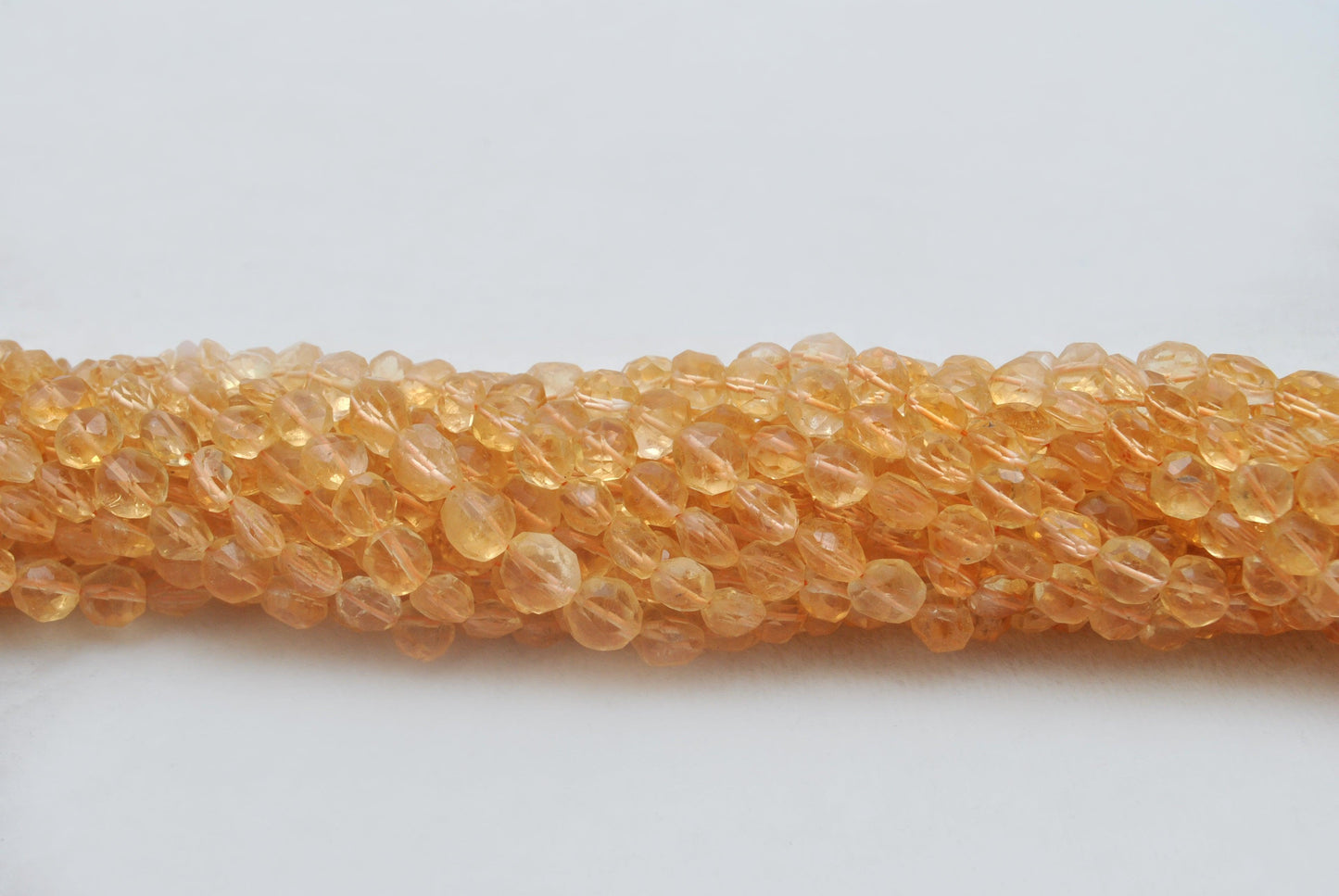 Citrine faceted coin beads for necklaces earrings - side profile