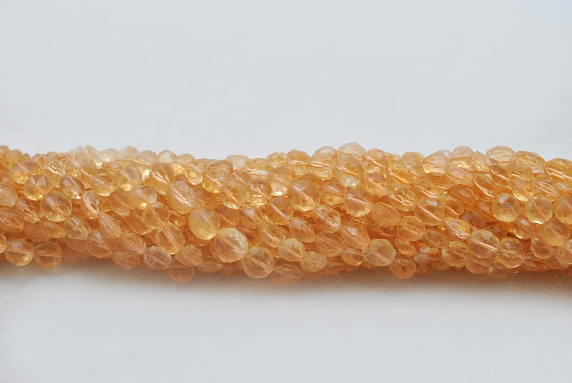 Citrine faceted coin beads for necklaces earrings - side profile