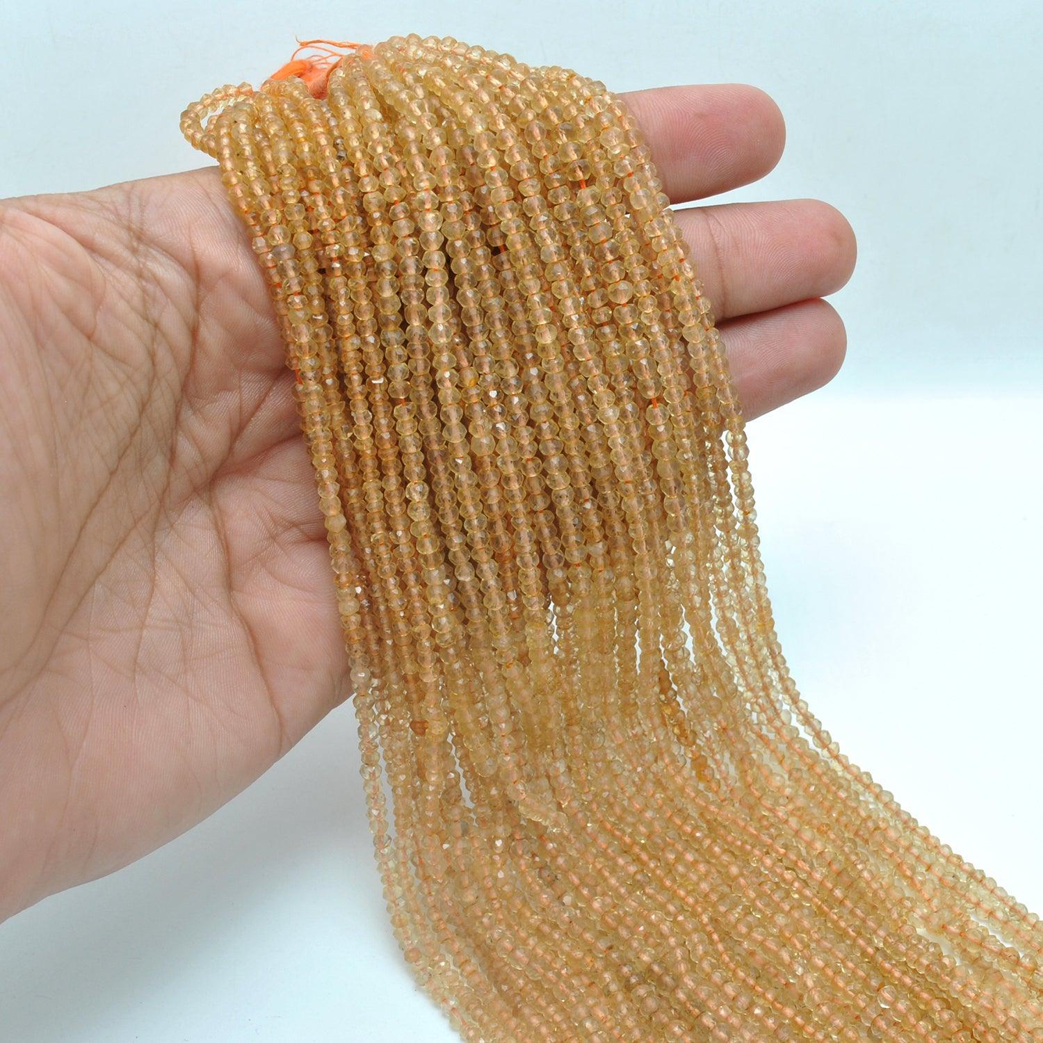 Citrine rondelle beads - close-up golden yellow faceted detail