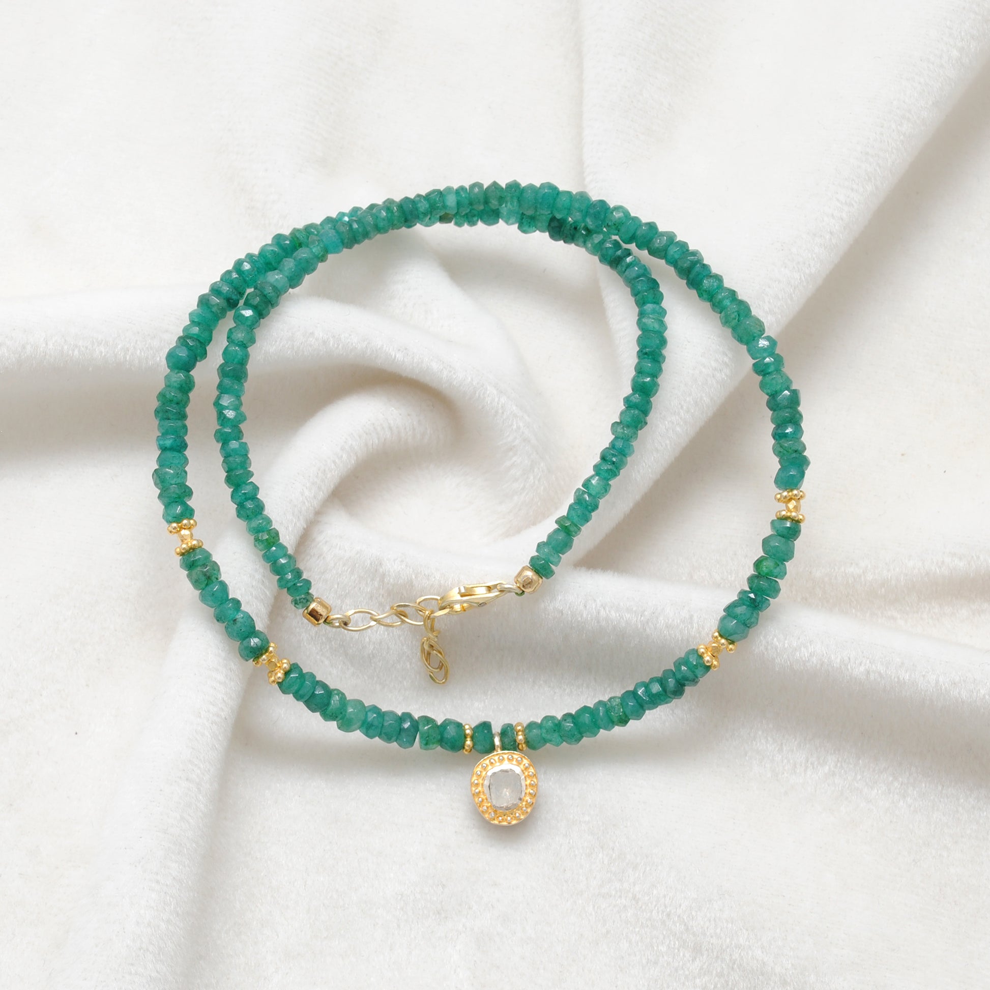 Faceted Emerald Gold Strand Necklace - Overhead View Gemstone