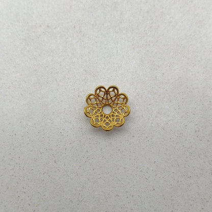 Filigree 18K gold bead cap - overhead view Jaipur artisan