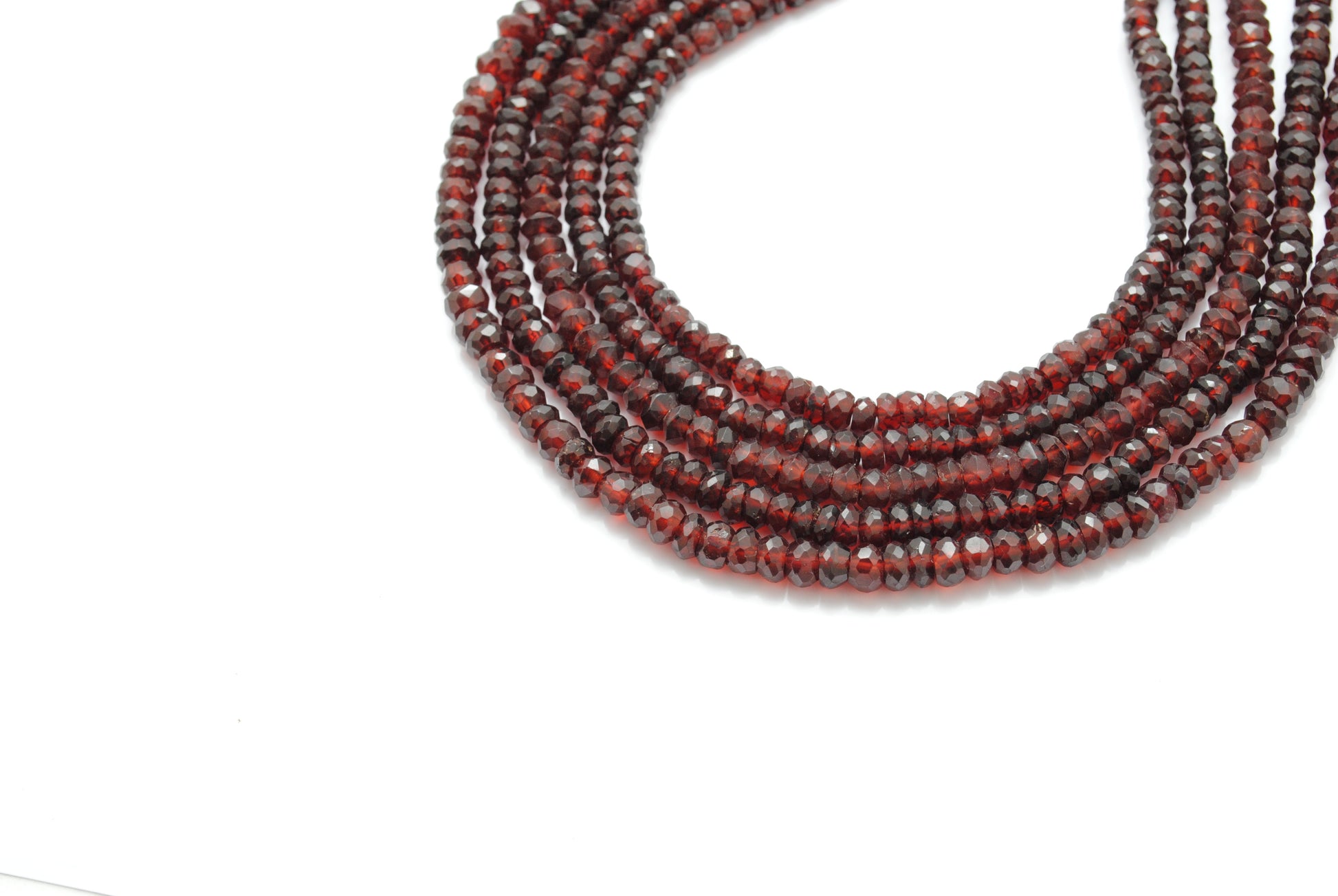 Garnet faceted rondelle beads - close-up deep burgundy red color