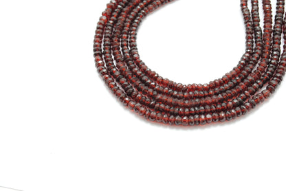Garnet faceted rondelle beads - close-up deep burgundy red color