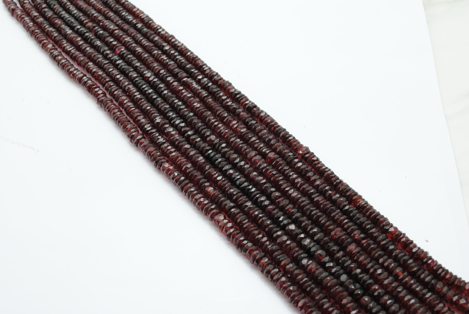 Garnet faceted tyre beads for bold jewelry - side profile