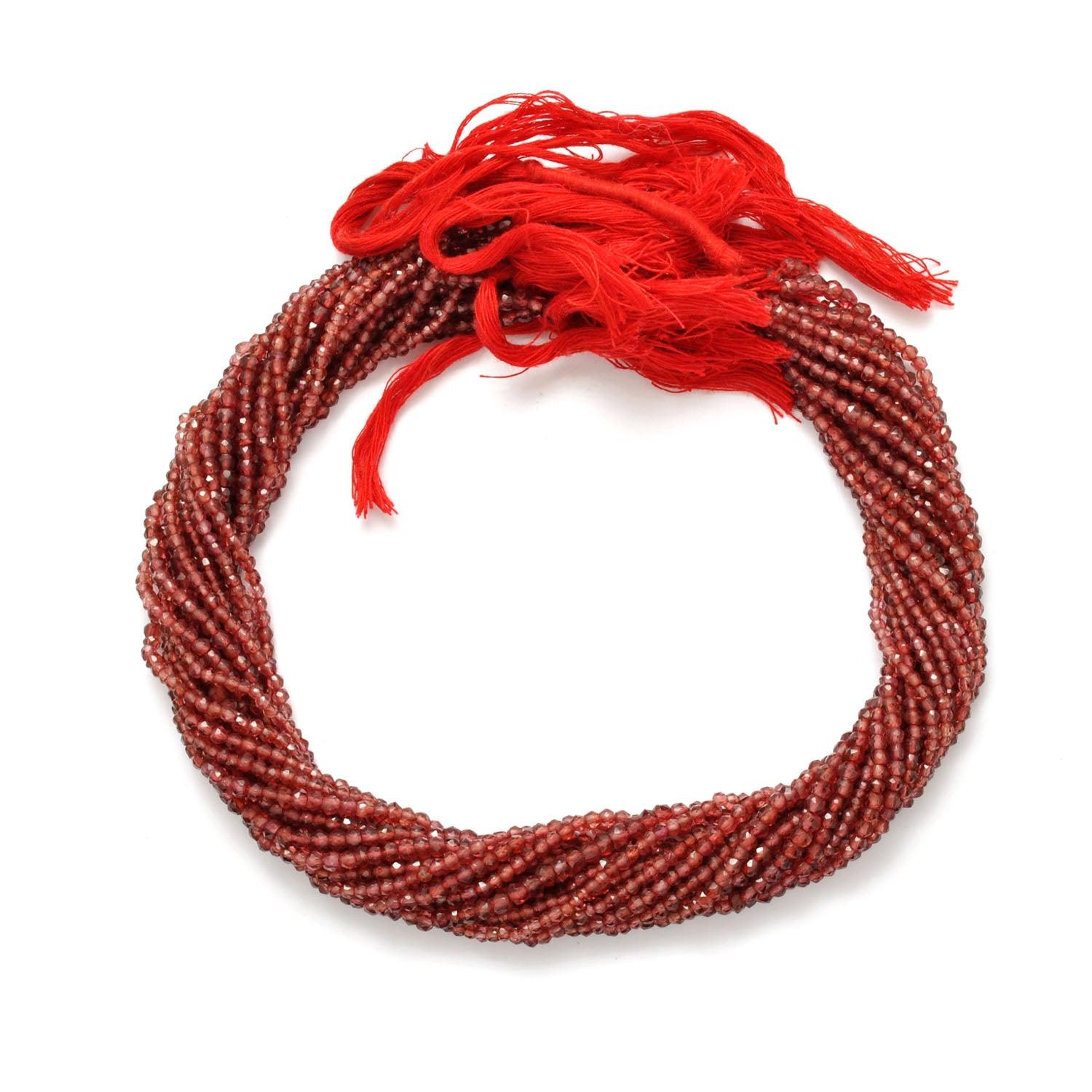 Garnet rondelle beads - close-up deep burgundy red faceted detail