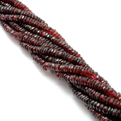 Garnet tyre barrel beads 6mm - close-up deep red faceted detail