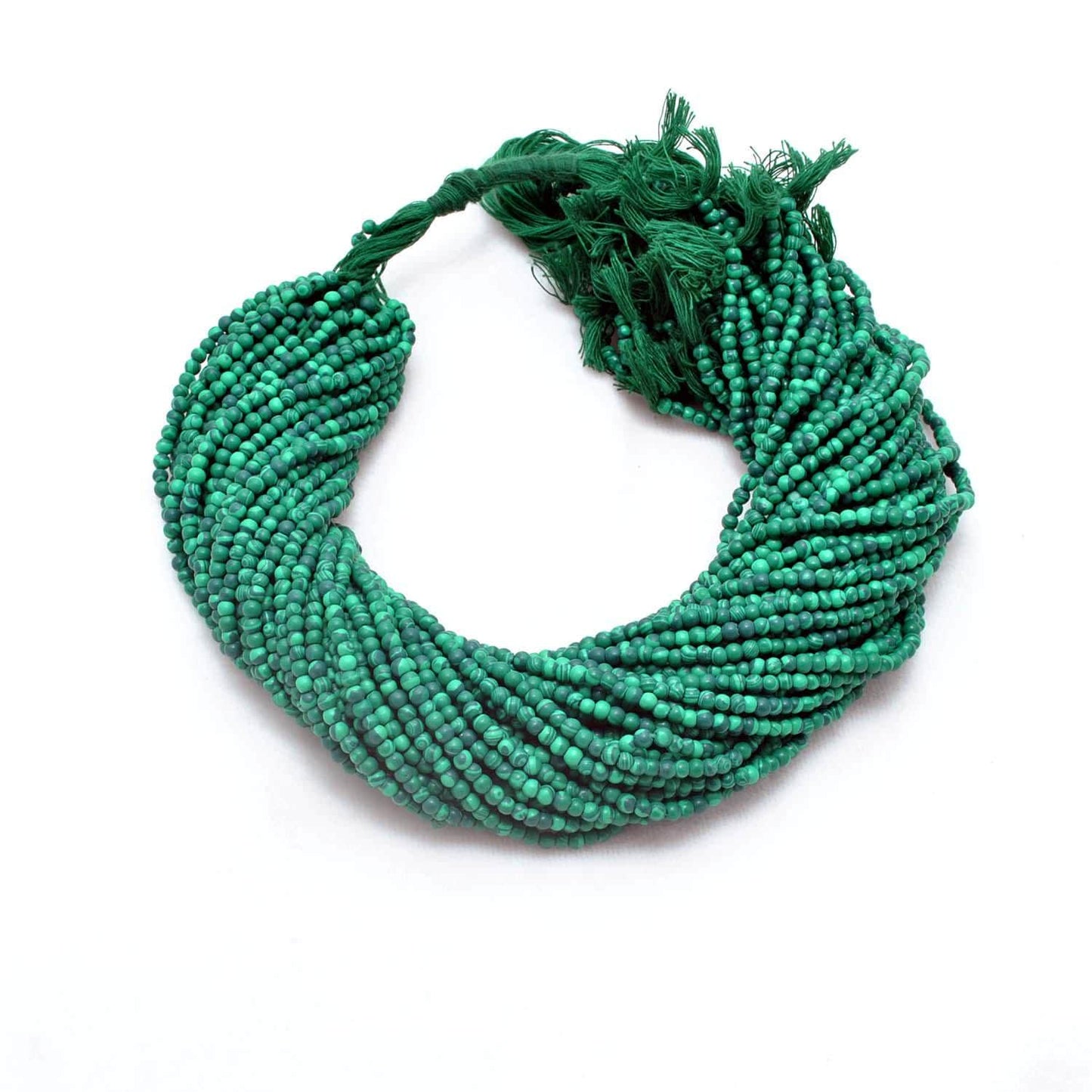 Green malachite rondelle beads - close-up concentric green banding