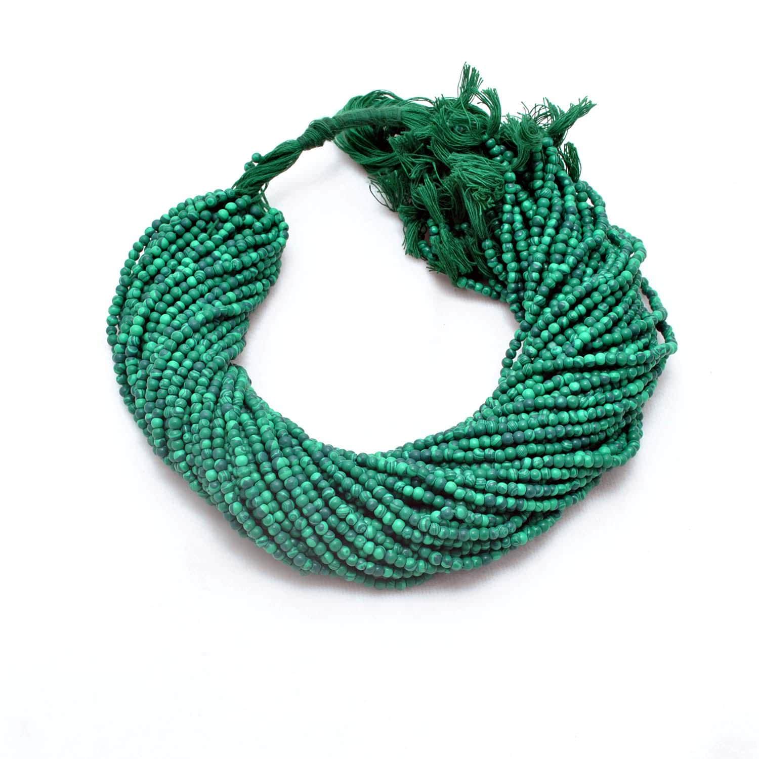 Green malachite rondelle beads - close-up concentric green banding