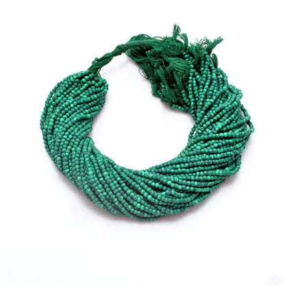 Green malachite rondelle beads - close-up concentric green banding