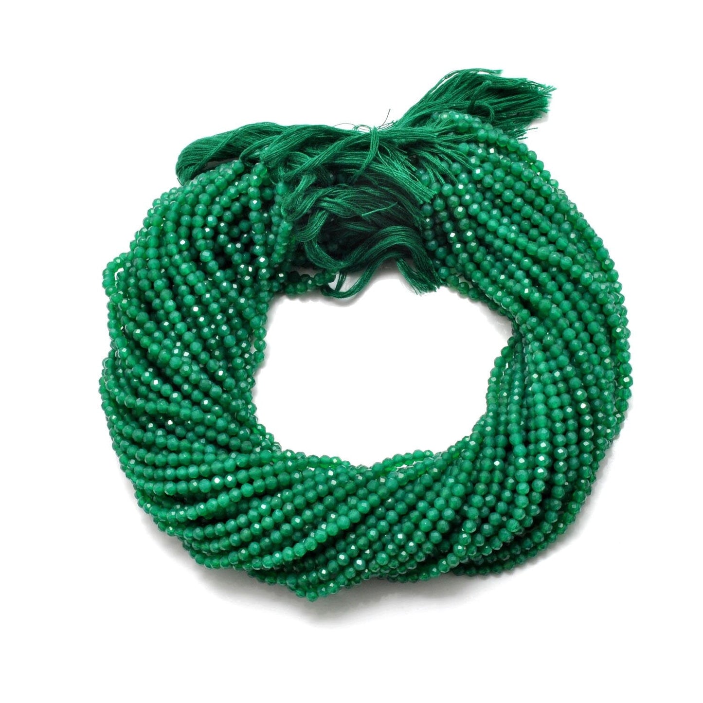 Green onyx faceted round beads - close-up forest green color