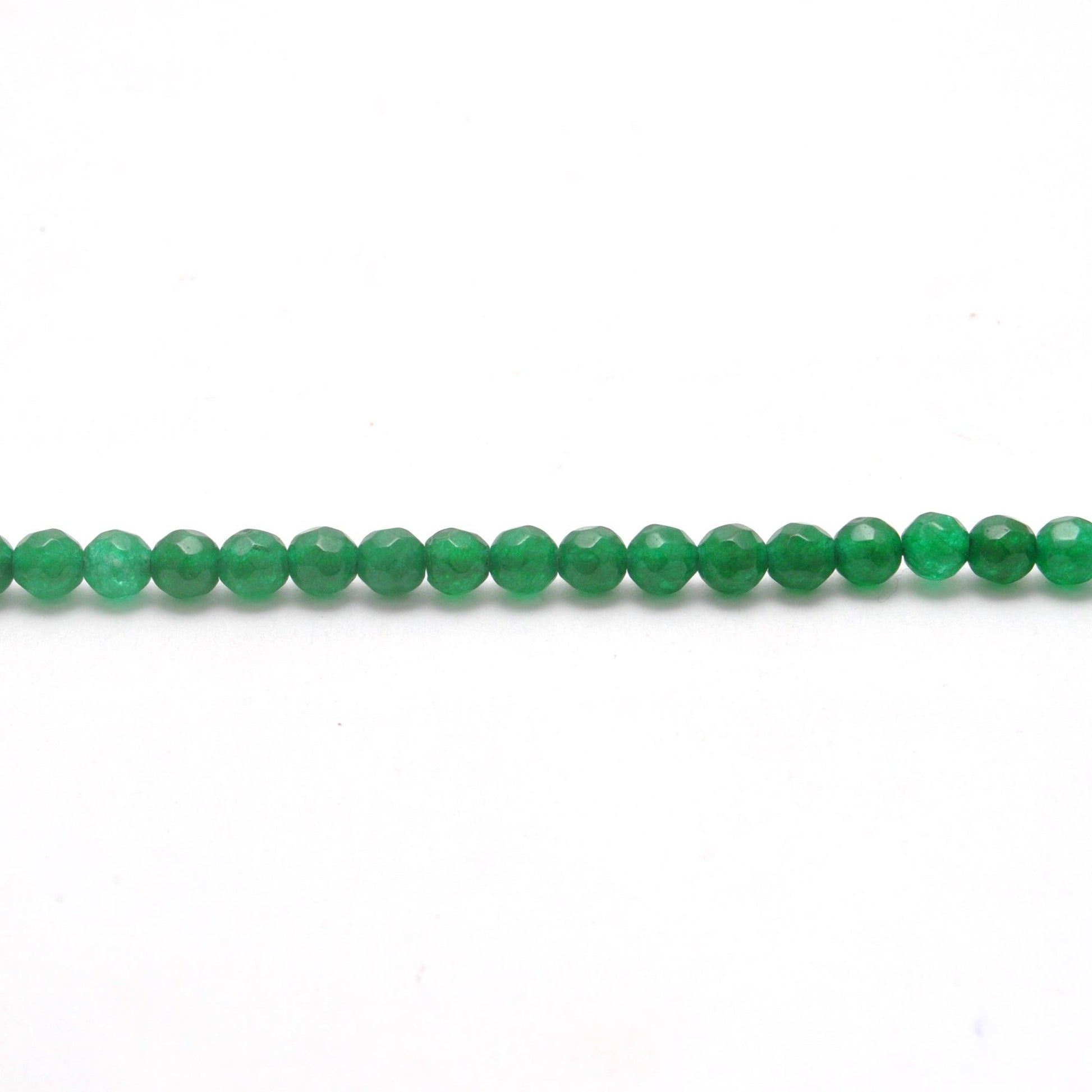 Green quartz 4mm round beads - close-up apple green sparkle
