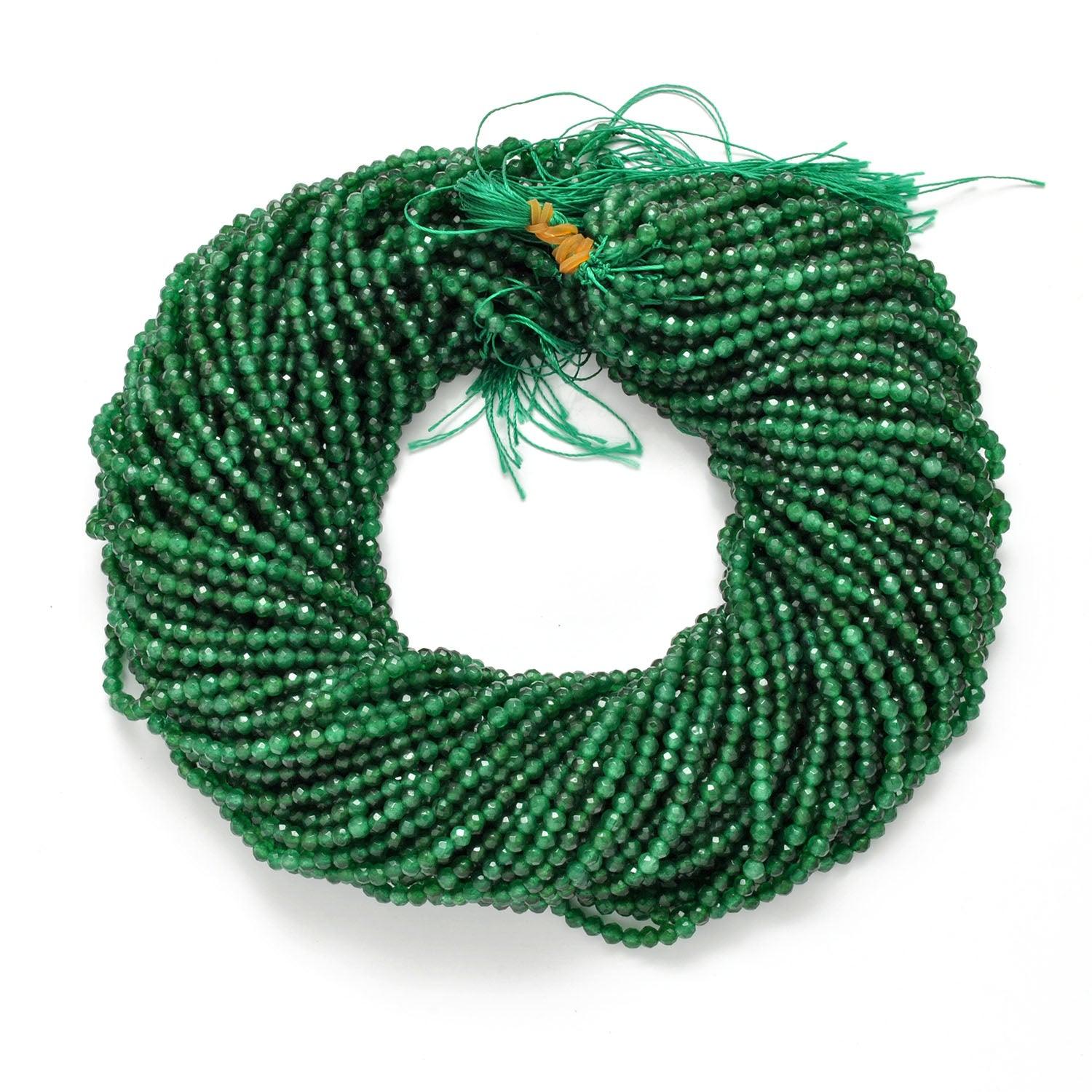 Green quartz faceted round strand 14 inch - overhead flat lay