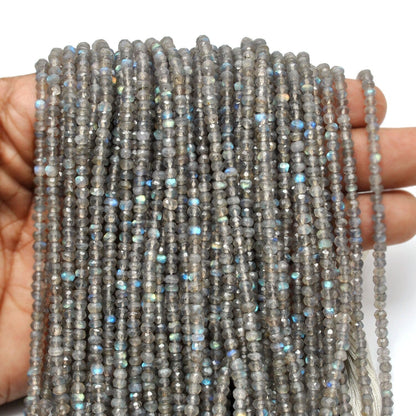 Grey labradorite rondelle beads - close-up silver flash detail