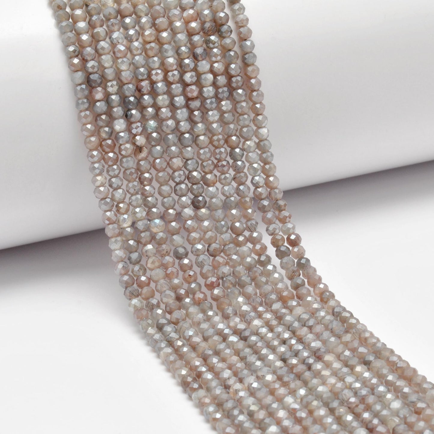 Grey moonstone beads - close-up adularescence inner silvery glow