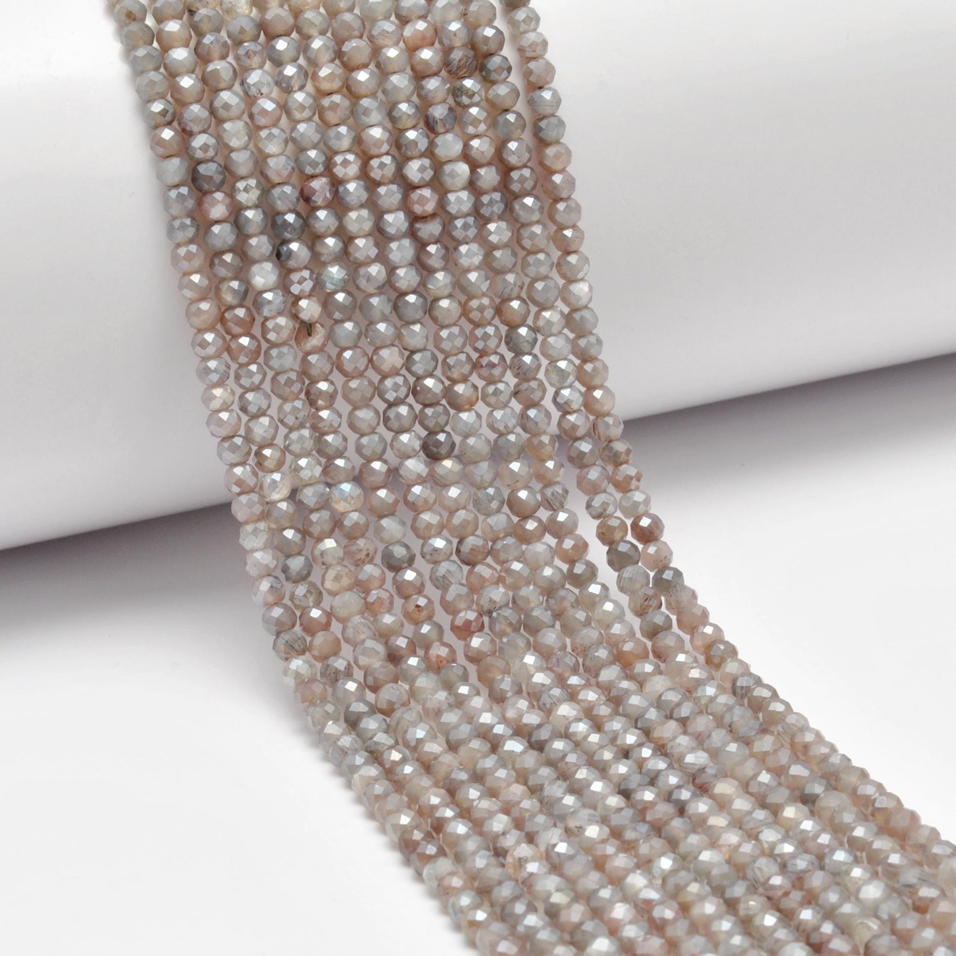 Grey moonstone beads - close-up adularescence inner silvery glow