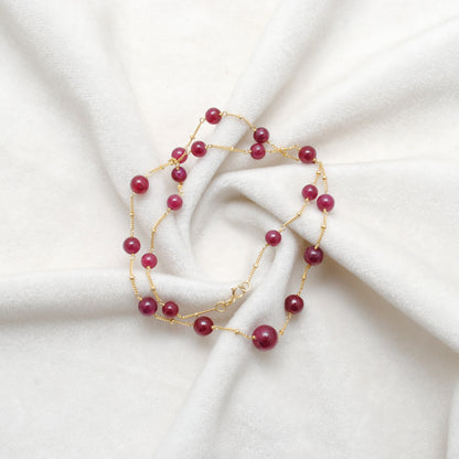 Handmade Ruby Ball Bead Gold Necklace - Flat Lay Lifestyle View
