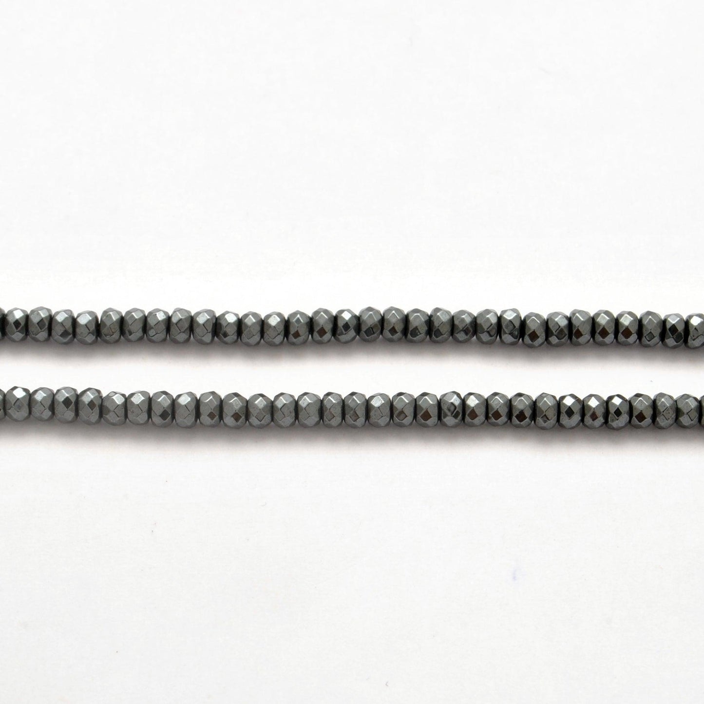 Hematite rondelle beads - close-up mirror metallic sheen detail